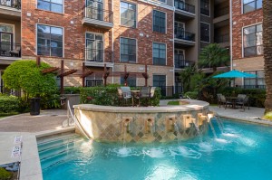 One Bedroom Apartments for Rent in Houston, TX - Up Close Pool Fountain & Seating Area (2)      